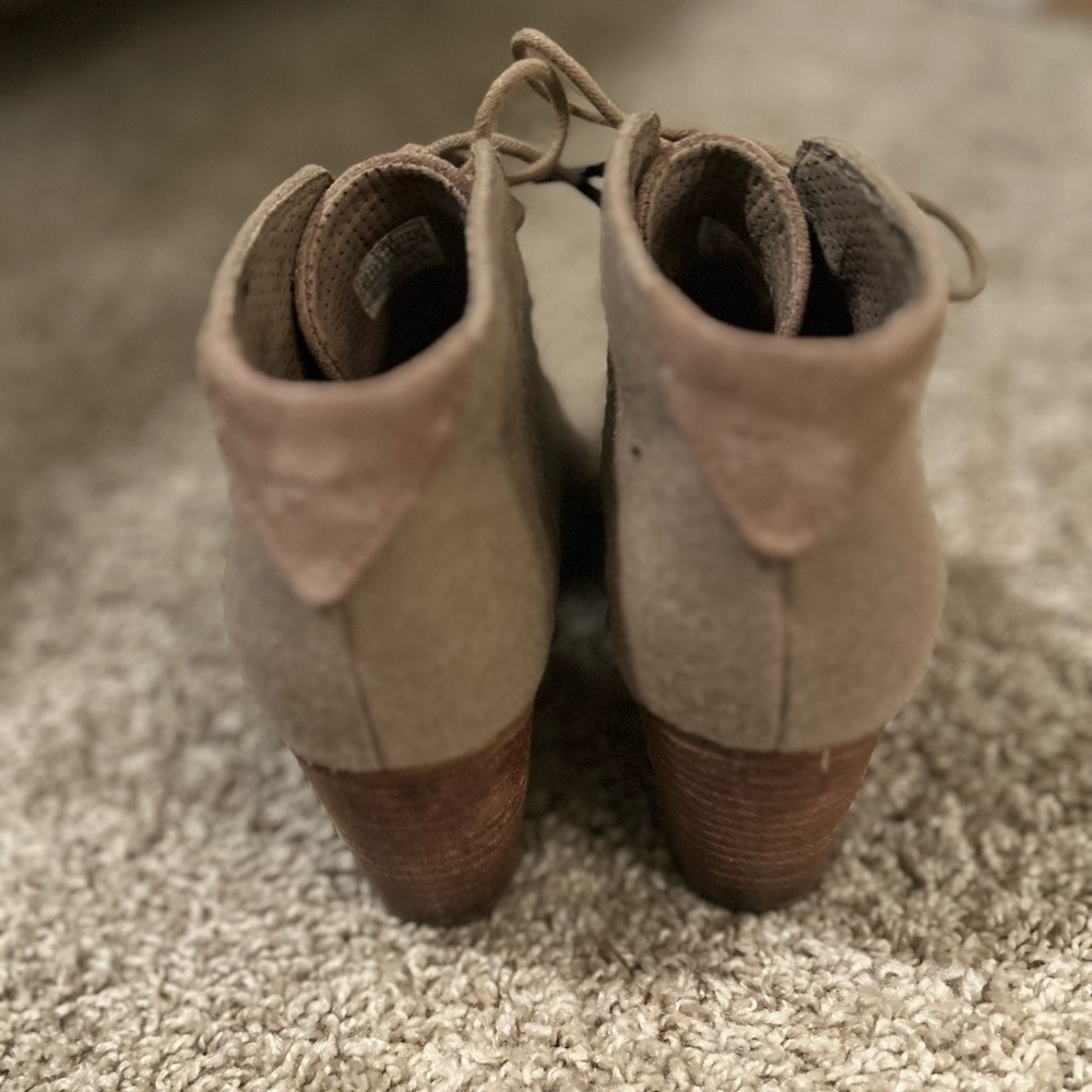 TOMS Oxford heels feature rounded toes, leather/fabricate & wooden heels.